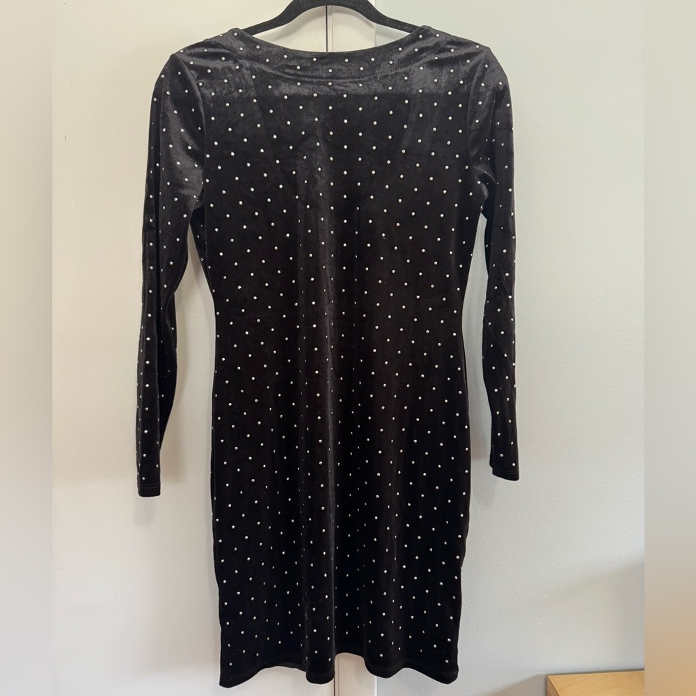 H&M Black velvet dress. Long sleeve with Silver Accents. Size medium